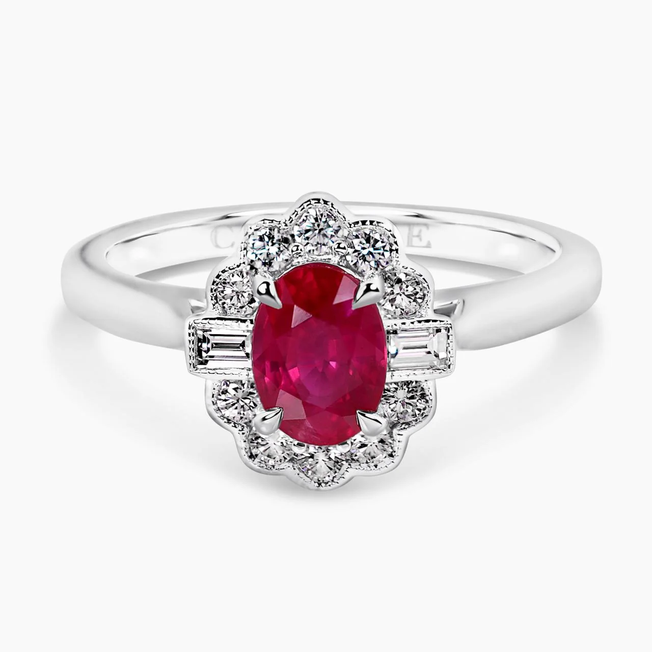 18ct white gold 0.97ct oval mozambique pigeon blood red ruby & diamond ring