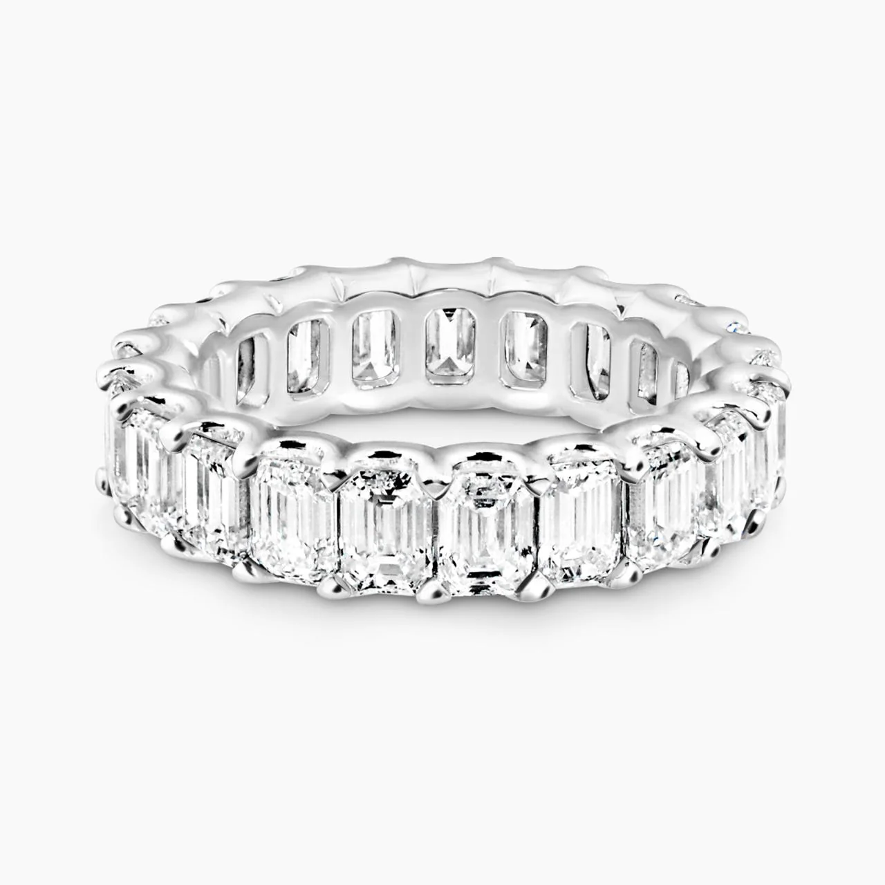 18ct white gold 5.37ct Emerald cut diamonds full circle ring in a claw setting