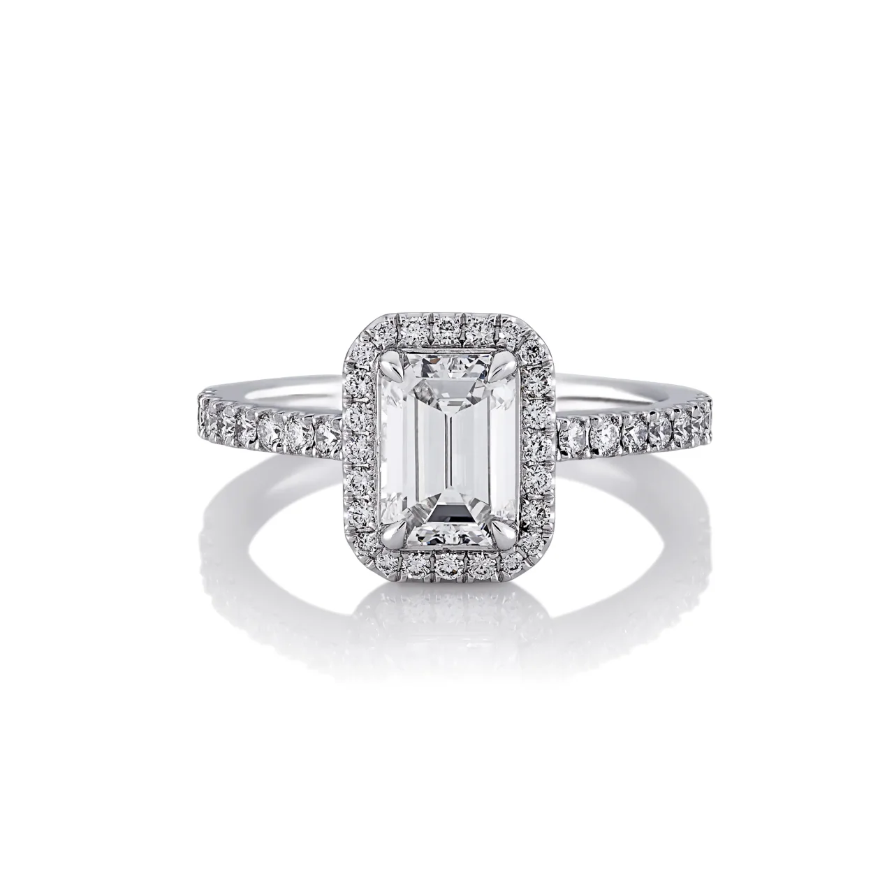 VERNAZZA UPSWEPT 18ct white gold emerald and round brilliant cut diamond halo engagement ring
