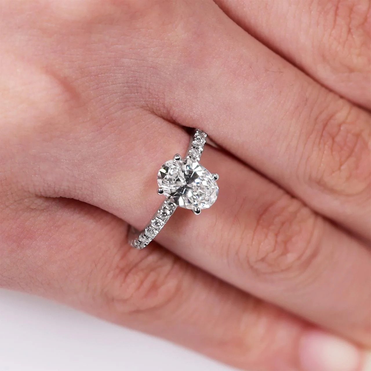 18ct white gold oval cut diamond engagement ring in a four claw setting with a diamond band. GIA Cert - Image 2