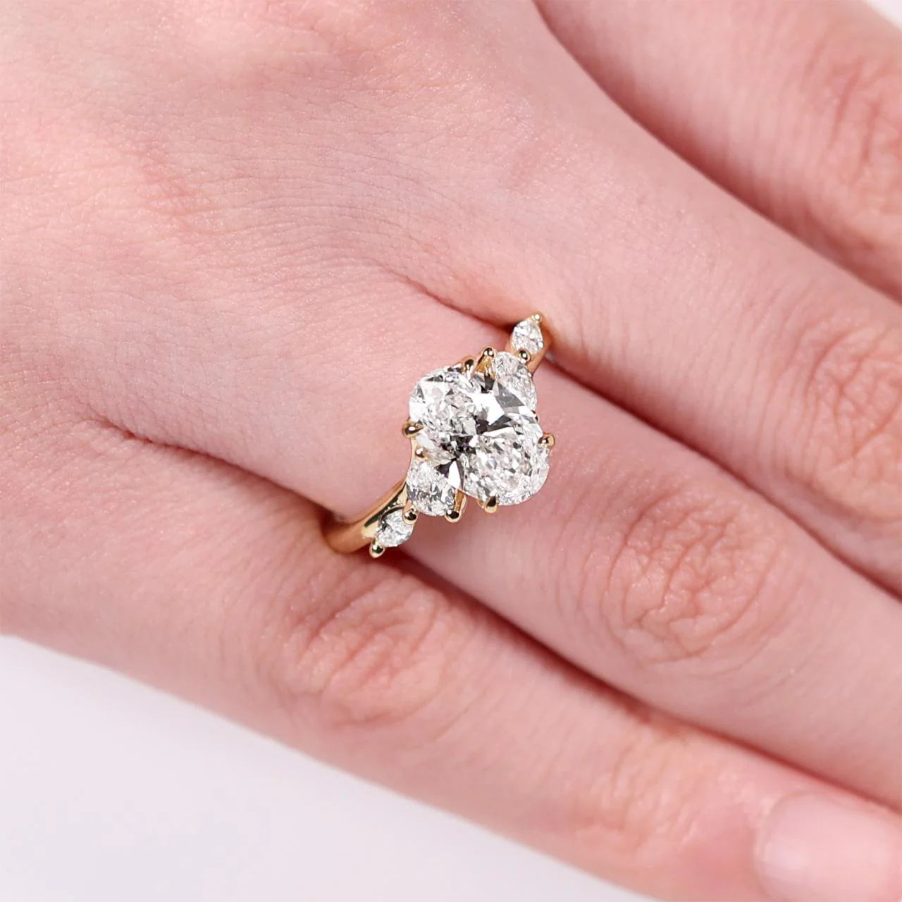 18ct yellow gold 2.00ct D VVS2 oval lab grown diamond ring with pear and marquise shaped lab grown diamonds. IGI Cert - Image 2