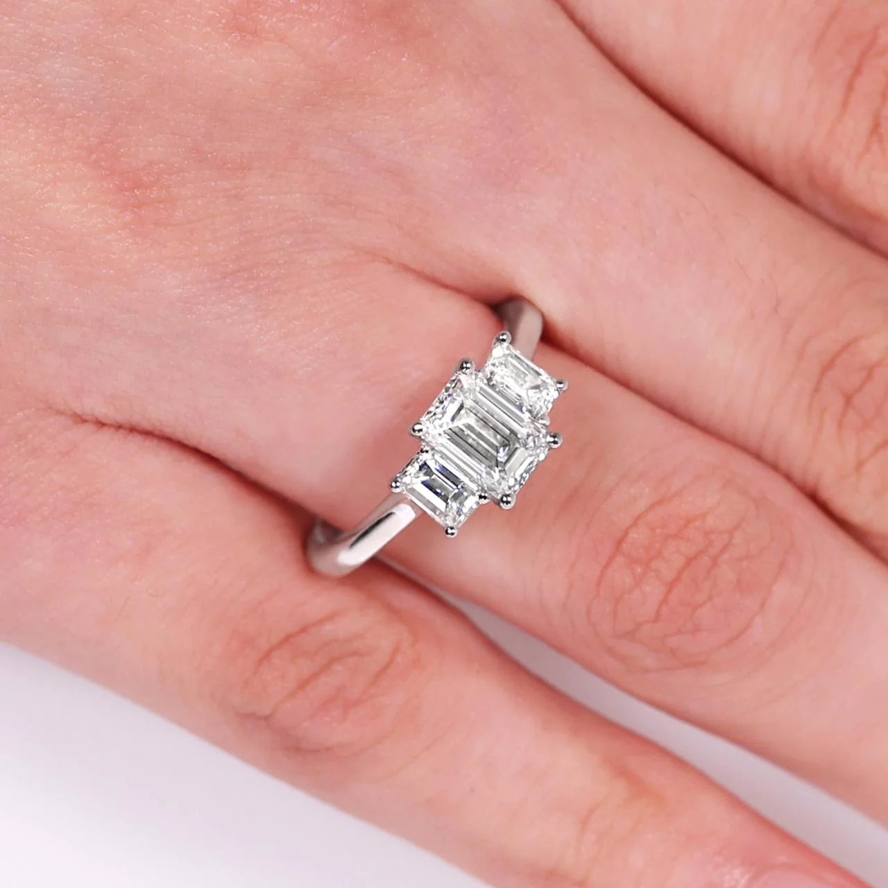 18ct white gold 1.20ct and 2=0.70ct emerald cut diamonds ring in a four claw setting GIA Cert - Image 5