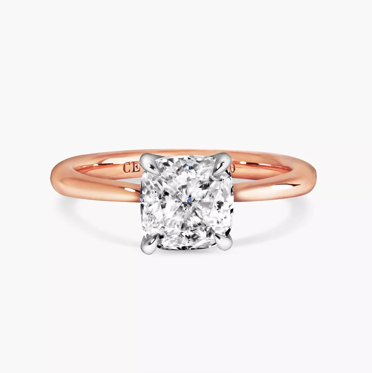 BARI 18ct rose and white gold cushion cut diamond four claw upswept tapered engagement ring