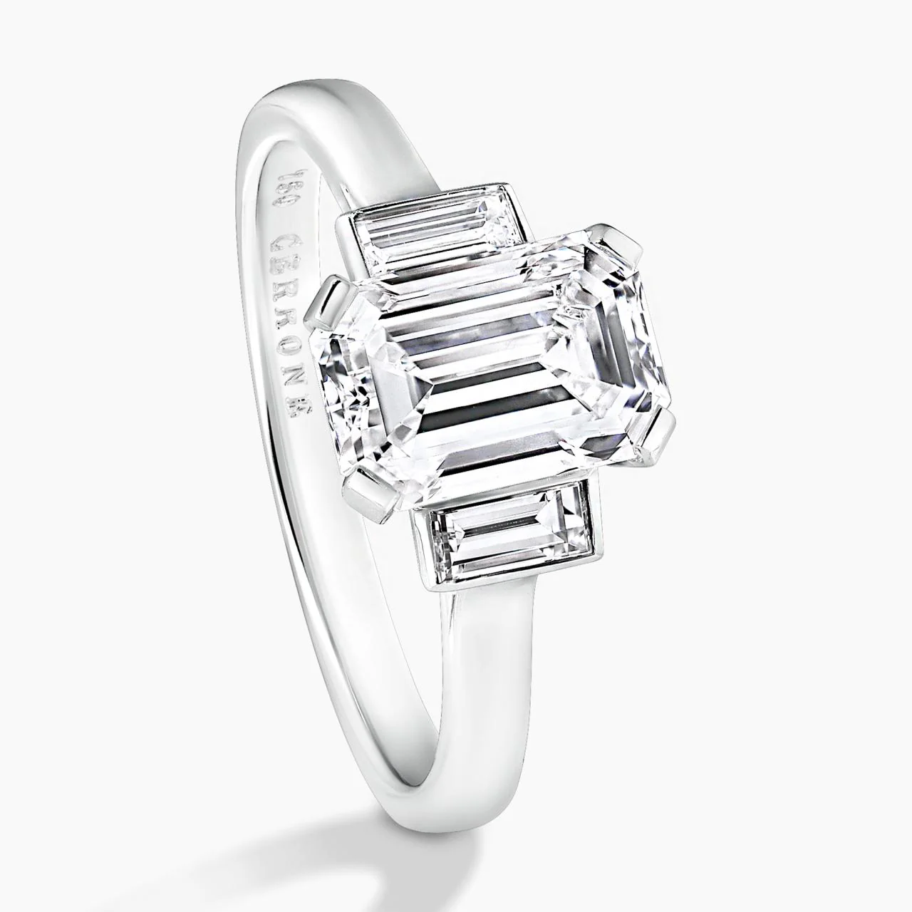 Platinum 1.81ct emerald cut diamond ring in four claw set with baguette diamonds in bezel set - Image 3