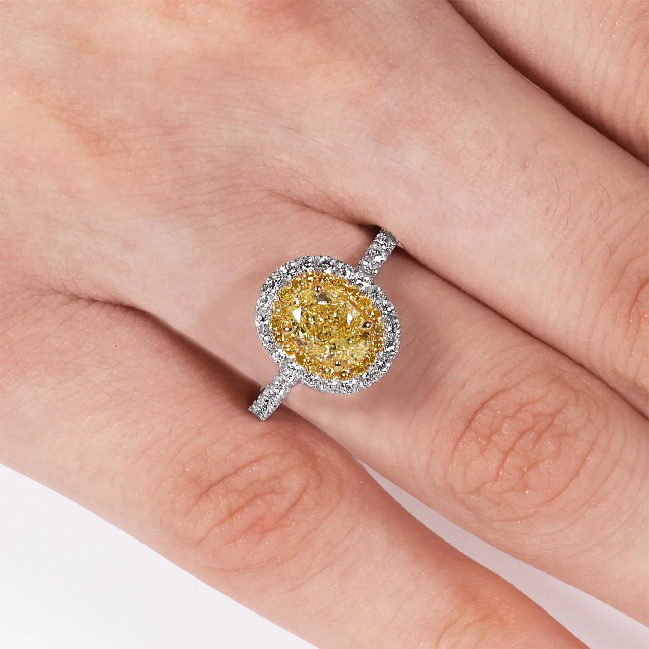 GIRASOLE Platinum and 18ct yellow gold 1.04ct Fancy Intense Yellow oval and round brilliant cut diamond claw set double halo engagement ring - Image 2