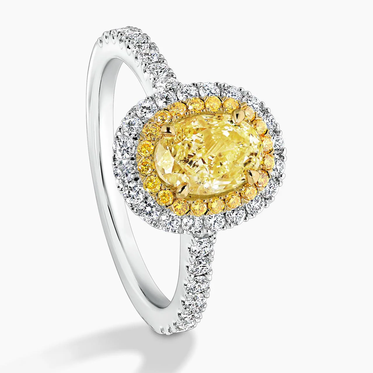 GIRASOLE Platinum and 18ct yellow gold 1.04ct Fancy Intense Yellow oval and round brilliant cut diamond claw set double halo engagement ring - Image 4