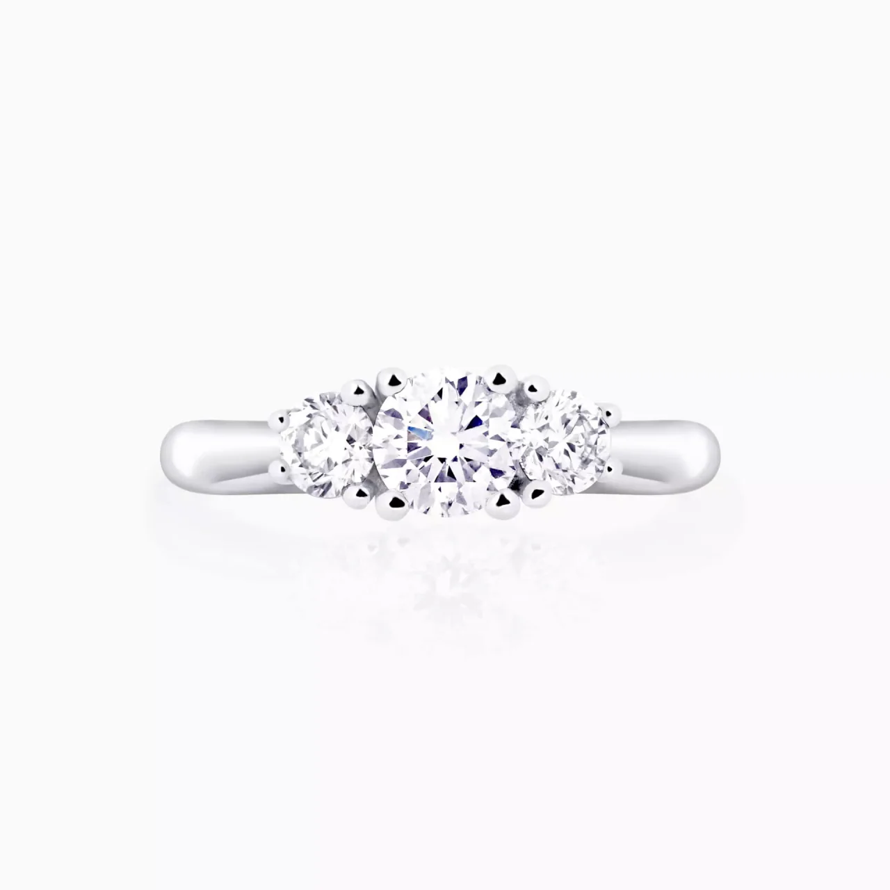 Platinum 0.40ct F SI round brilliant cut diamond trilogy engagement ring